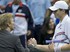 John Isner (USA) and American captain Jim Courier