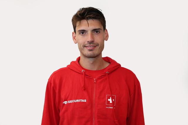 Headshot of Marc-Andrea Huesler