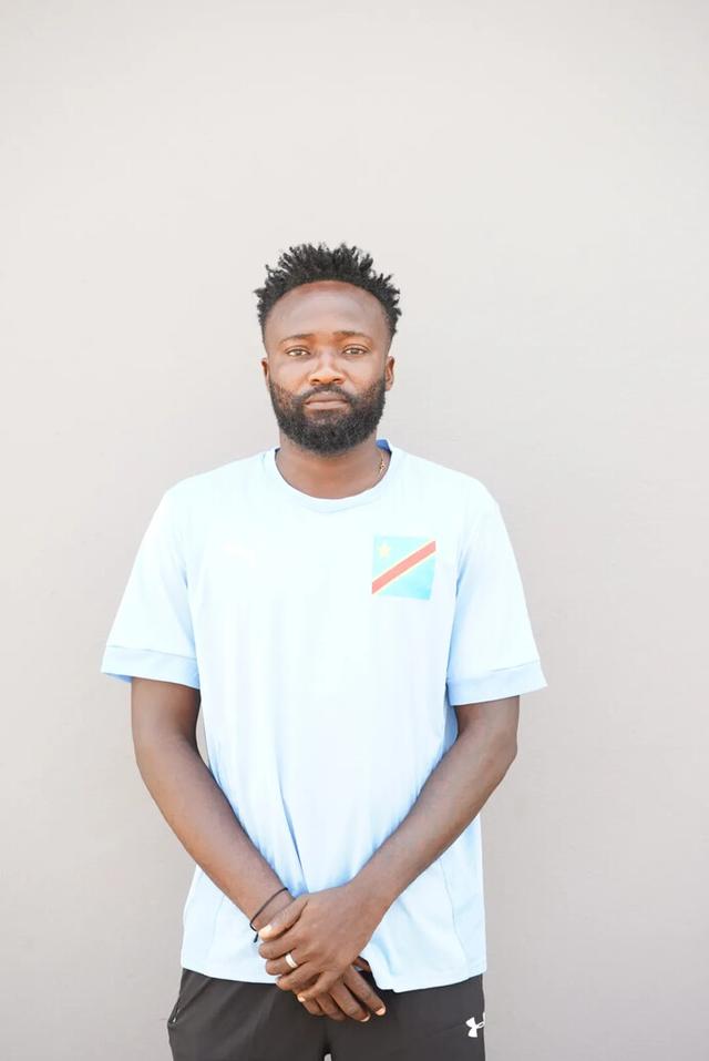 Headshot of Arnold Ikondo Moke