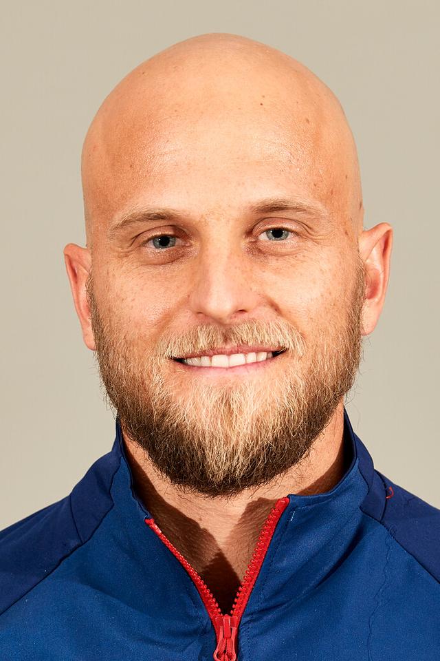 Headshot of Denis Kudla