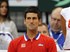 Novak Djokovic (SRB) and captain Bogdan Obradovic